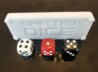 Spotted Dice by Benke Smith and Andras Barthazi